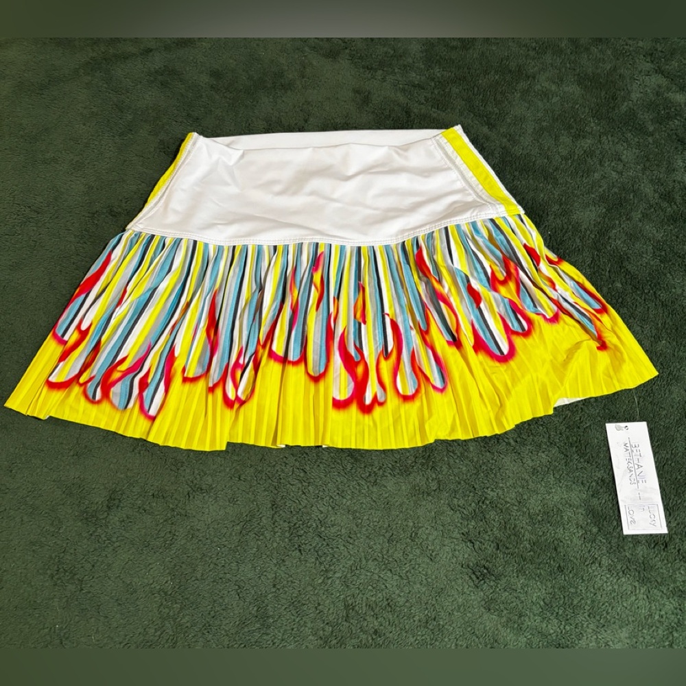 Lucky in Love White Tennis Skort with Yellow Pleated Flame Print